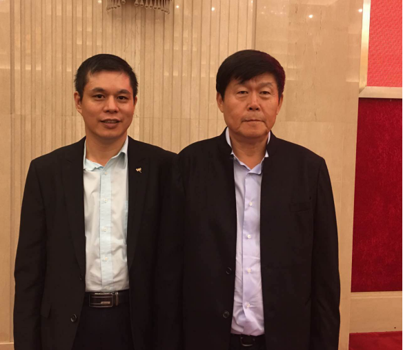 猫先生官网董事长郑两斌与北京黑龙江企业商会会长田在玮合影
